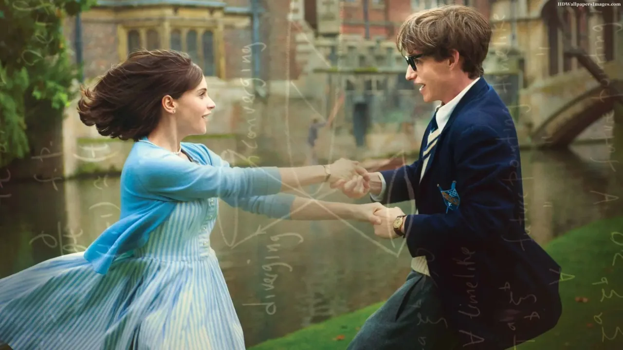 This image features Eddie Redmayne as Stephen Hawking and Felicity Jones as Jane Wilde in a joyful scene from the 2014 biographical drama movie The Theory of Everything. The two characters are captured mid-spin while smiling warmly and holding hands outdoors next to a river on a university campus background, overlaid with faint mathematical equations and diagrams.